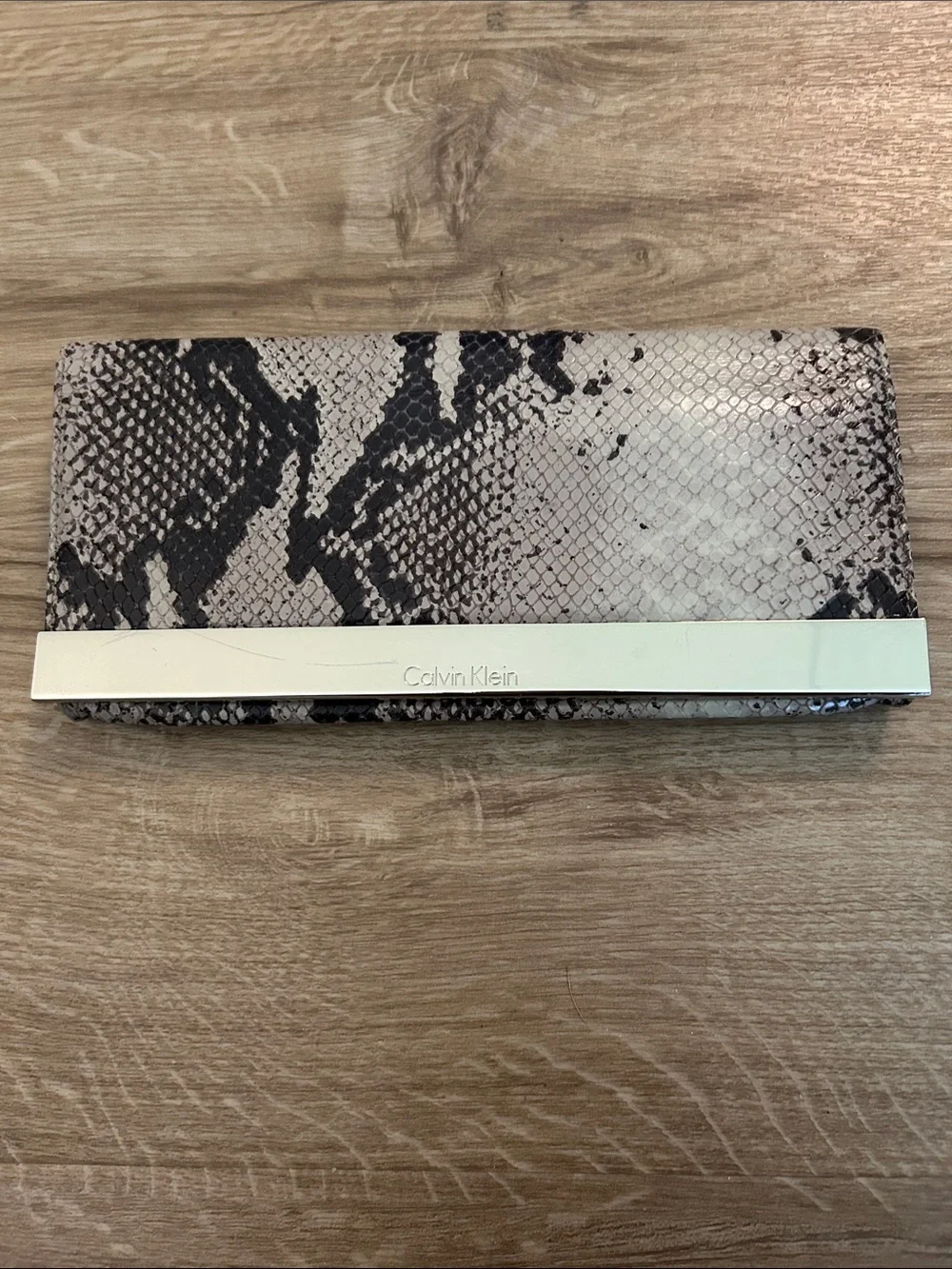 Calvin Klein Snake-Print Clutch Wallet in Beige and Black with Gold Accent